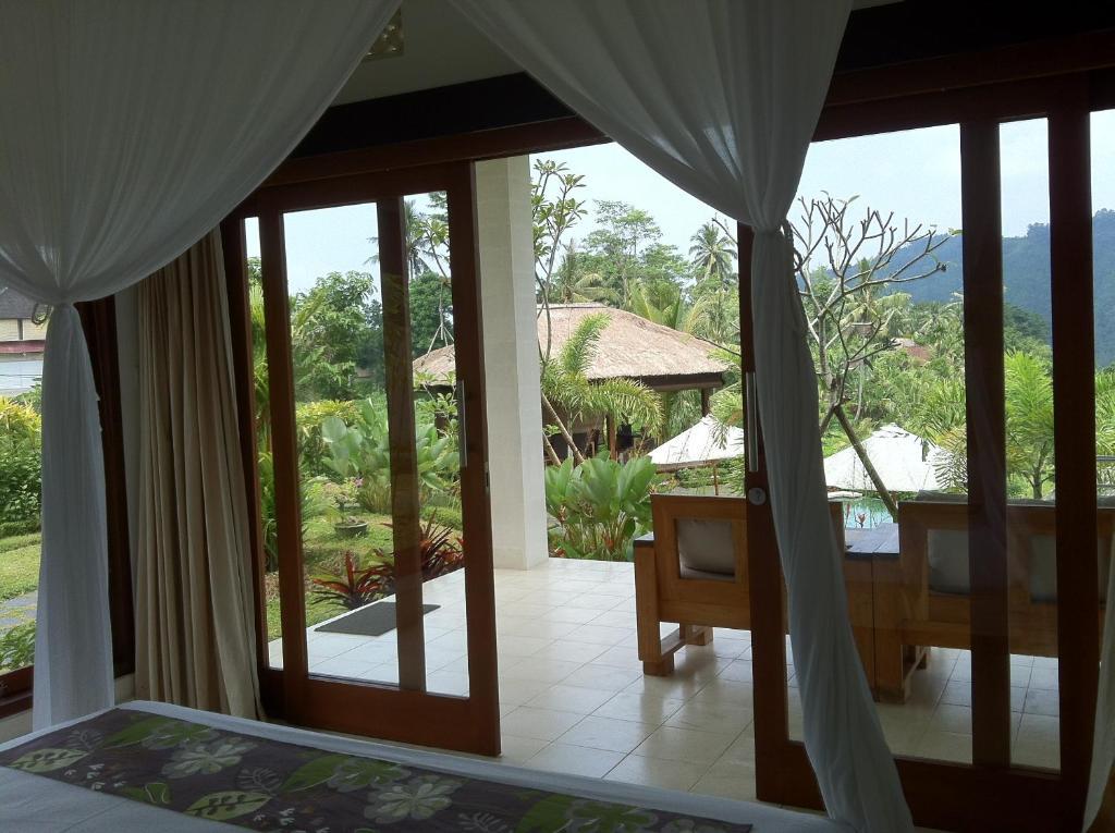 Villa Shantiasa Bali Сідемен Номер фото